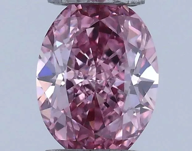 0.18ct Oval Natural Diamond (Colour Fancy Vivid Purplish Pink, Clarity VVS1, GIA Certified)
